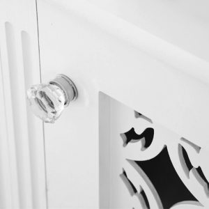 Detail of Jali Cupboard with fretwork door panel and crystal glass handle featured by Becky Clarke