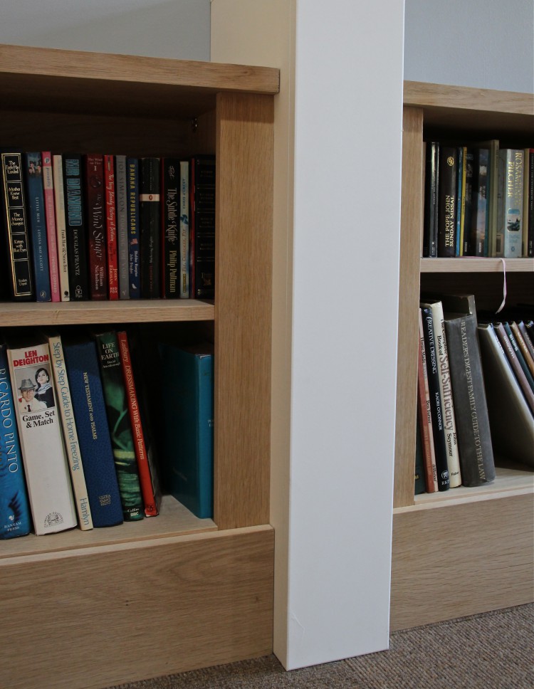 Bespoke Jali bookcases in real oak veneer, designed to fit against walls