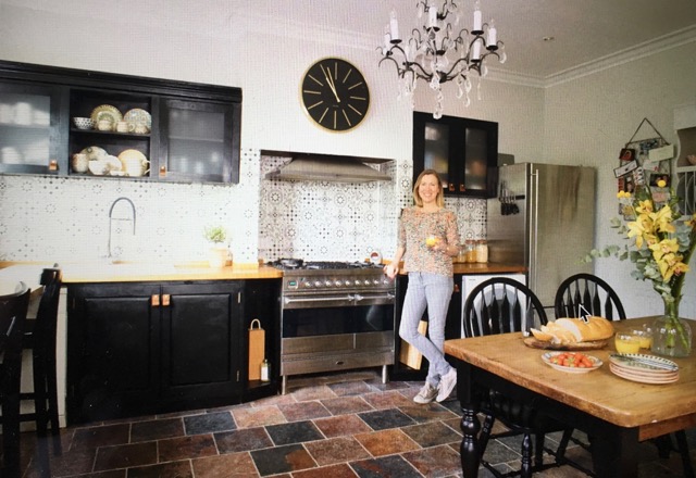 Claire with bespoke Jali cupboards in Your Home magazine