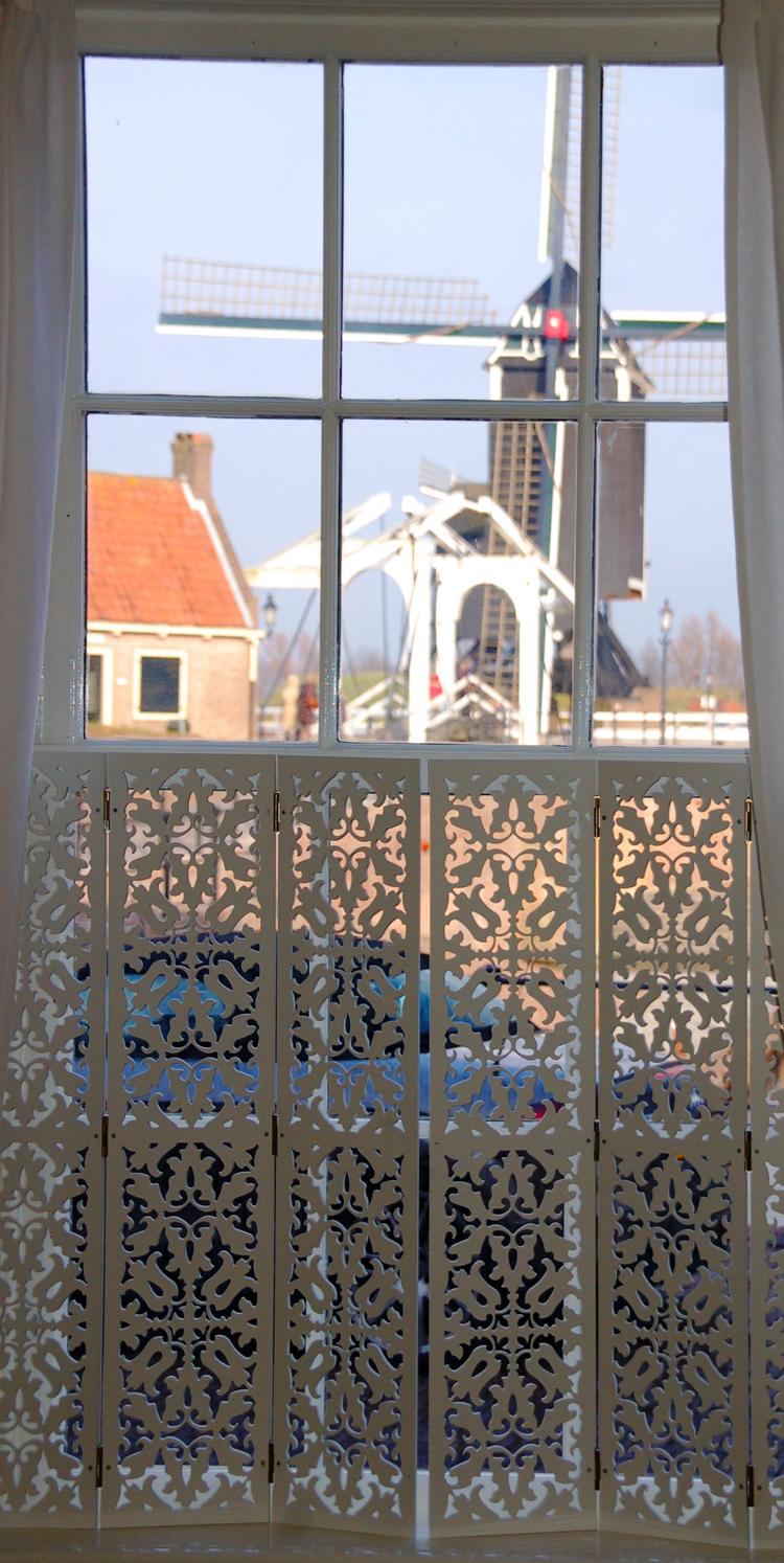 Jali decorative window shutters with Dutch windmill