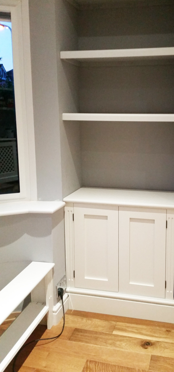 Jali bespoke cupboards in alcove and as part of wndow seat