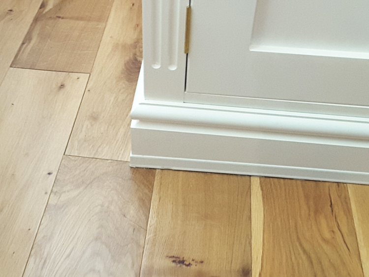 Trim added to Jali bespoke cupboard skirting to cover gap to floor