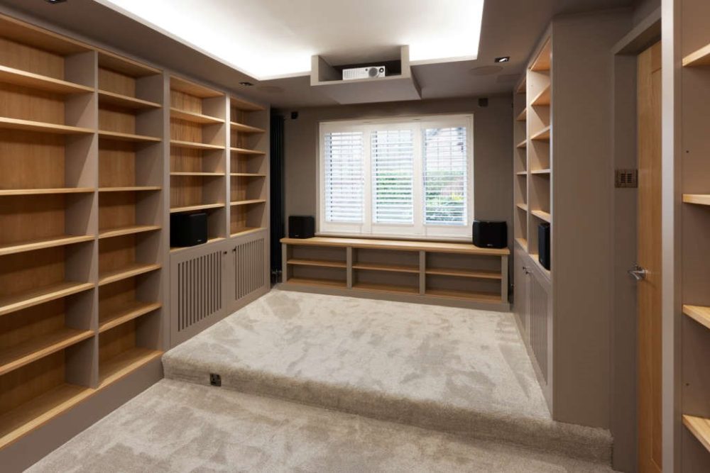 Cinema Room with Jali Shelving and Cupboards