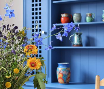 Bespoke blue Dresser by Jali with flowers