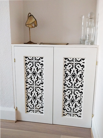 Jali bespoke cupboard with fretwork doors