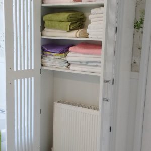 Bespoke linen airing cupboard by Jali