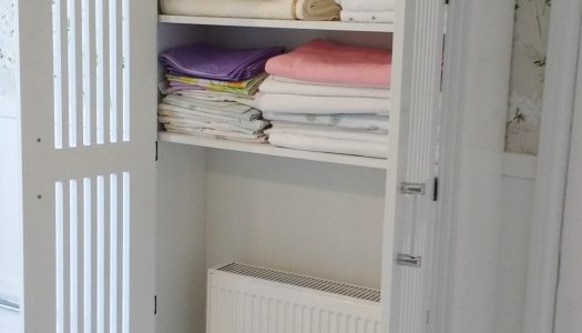 Bespoke linen airing cupboard by Jali