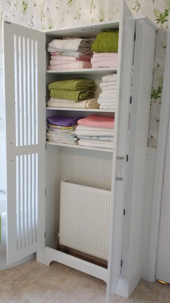 Bespoke linen airing cupboard by Jali