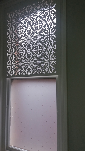 Jali fretwork used as window screen, with window film